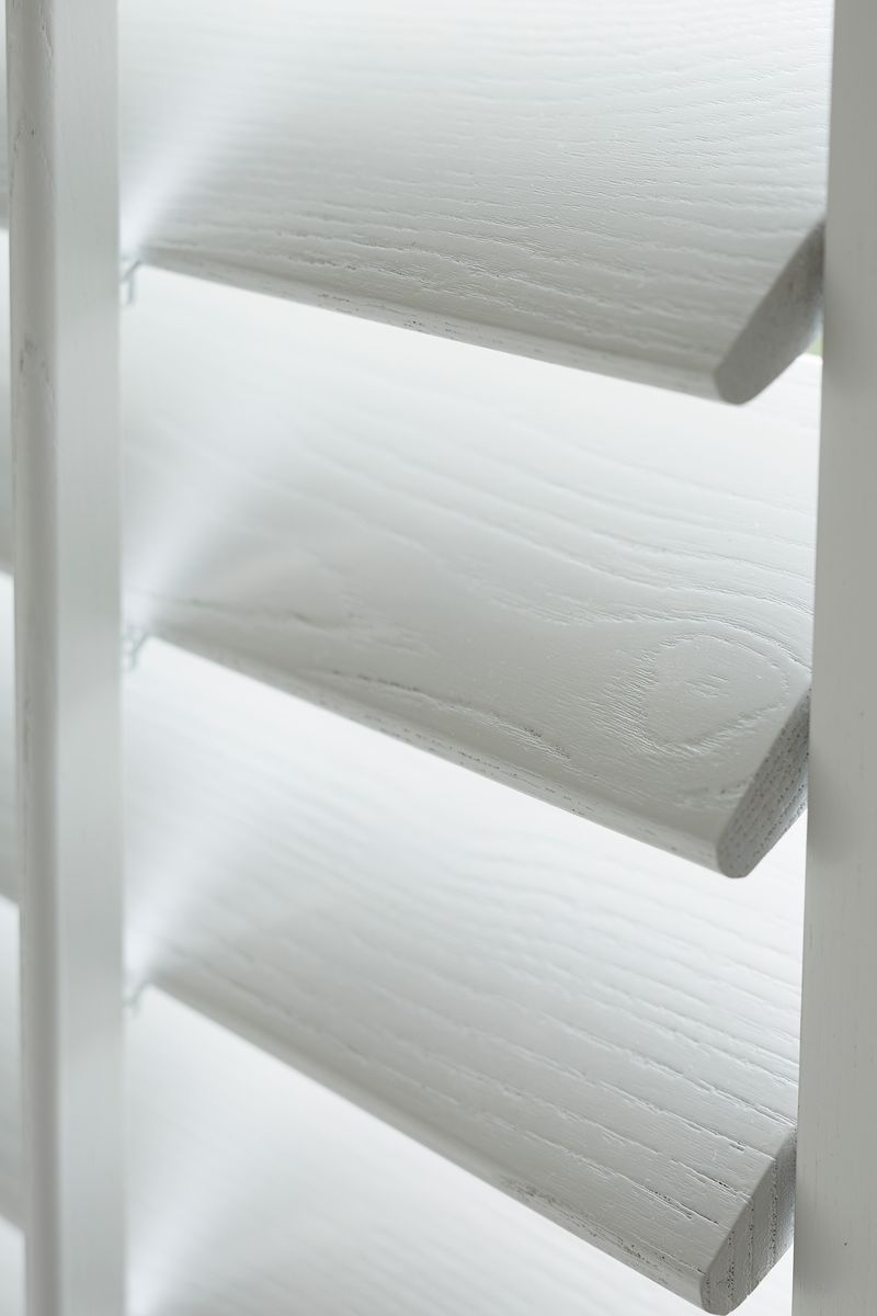 Close-up of painted plantation shutter louvres