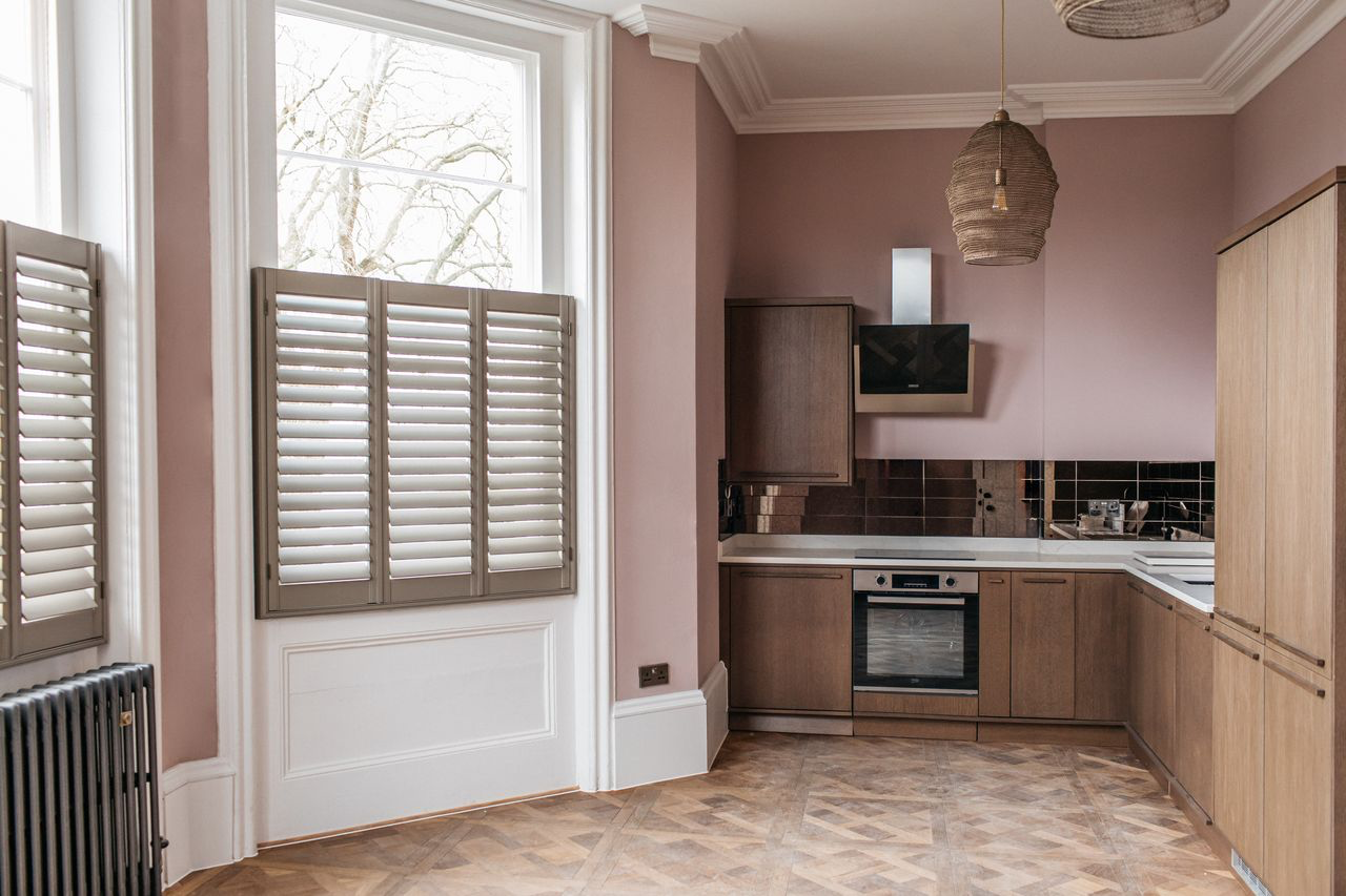 Complementary shutter styling in a Durham home
